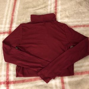 Red turtle neck body suit